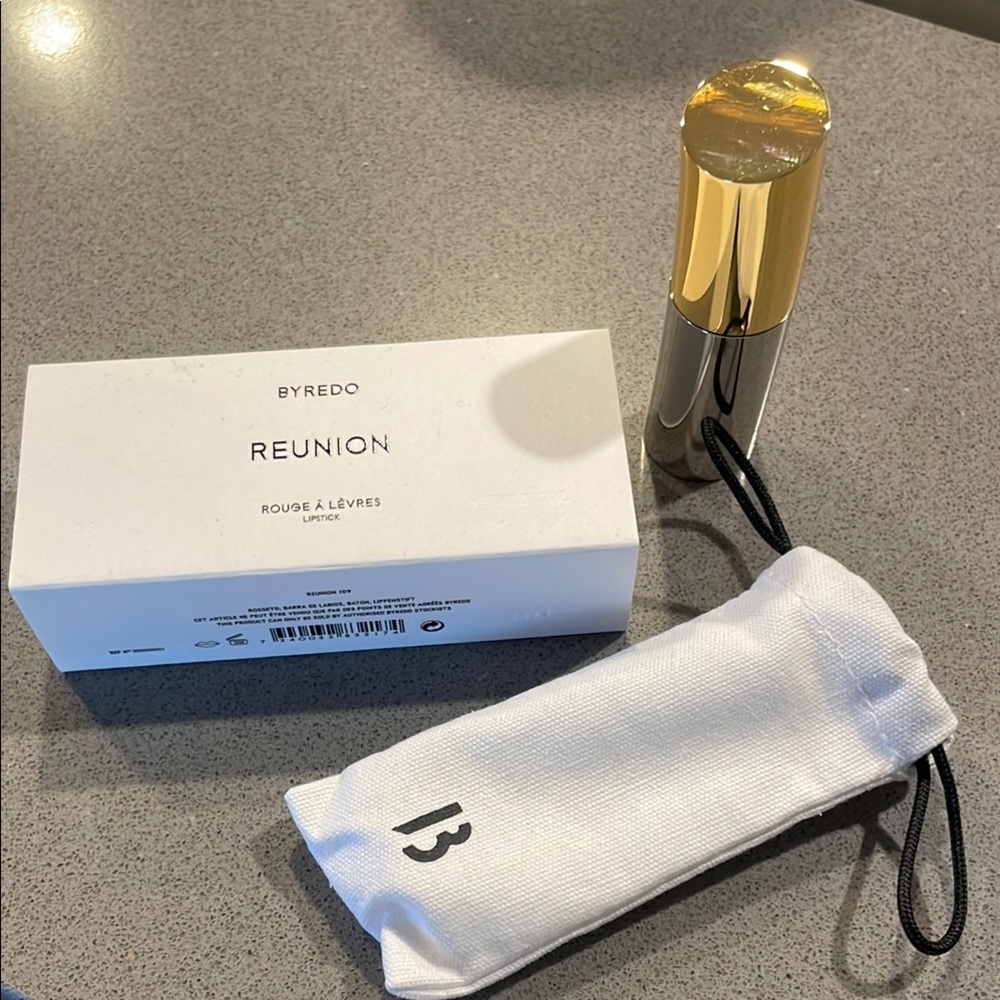 Byredo Reunion Lipstick with Gold and Silver Case